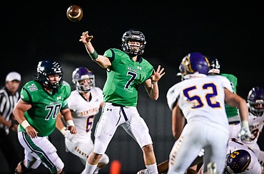 Glacier quarterback Gage Sliter (7) completes a pass to Kaid Buls for a first down on a key fourth down in the fourth quarter against Missoula Sentinel at Legends Stadium on Friday, Sept. 16. (Casey Kreider/Daily Inter Lake)