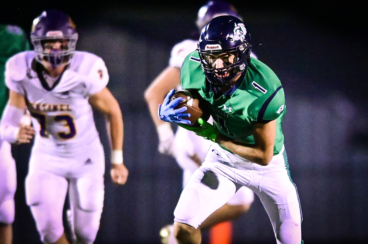 Glacier wide receiver Cohen Kastelitz (1) picks up yardage after a reception in the fourth quarter against Missoula Sentinel at Legends Stadium on Friday, Sept. 16. (Casey Kreider/Daily Inter Lake)