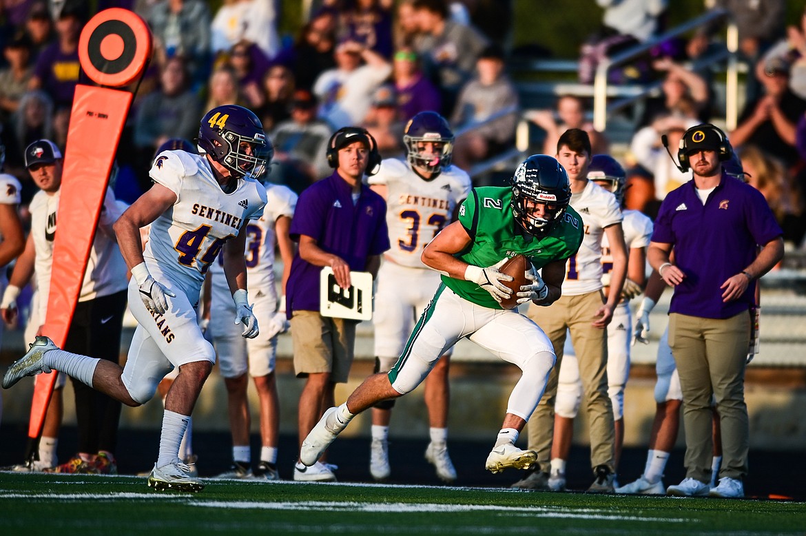 Glacier running back Jackson Hensley (2) picks up yardage after a reception along the sideline in the first quarter against Missoula Sentinel at Legends Stadium on Friday, Sept. 16. (Casey Kreider/Daily Inter Lake)