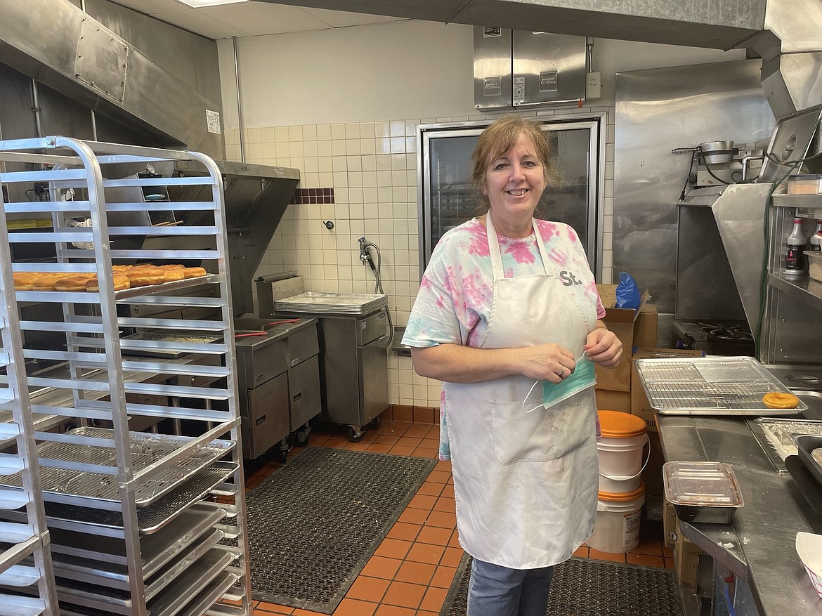 Danielle Bailey stands in the kitchen of Corner St. Donuts after a long day of baking, icing and selling donuts. Bailey opened Corer St. in the old Taco Time building at the corner of Alder Street and E. Broadway in downtown Moses Lake because the city needed a donut shop, and because she also had fond memories of going to Donut Depot with her grandfather and father and wanted to give other people the opportunity to make those kinds of memories as well.