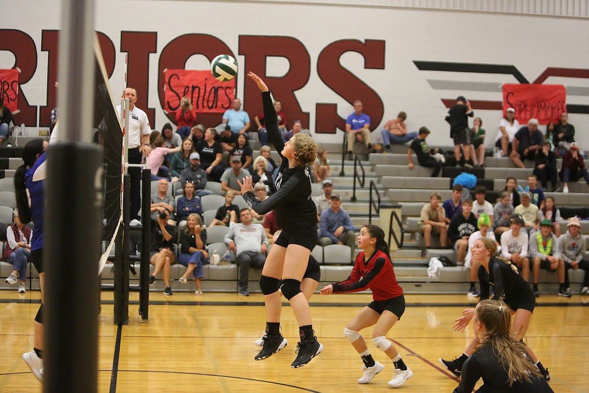 ACH’s Mariah McWalter returns a volley in the Warriors’ 3-0 win over Wellpinit.