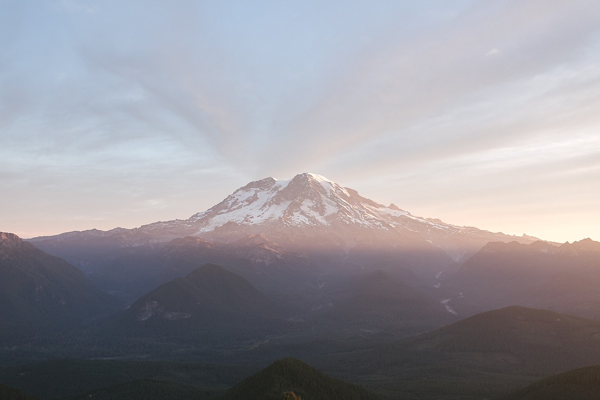 Cooling, wetter weather has allowed authorities to lift a fire ban near Mount Rainier.