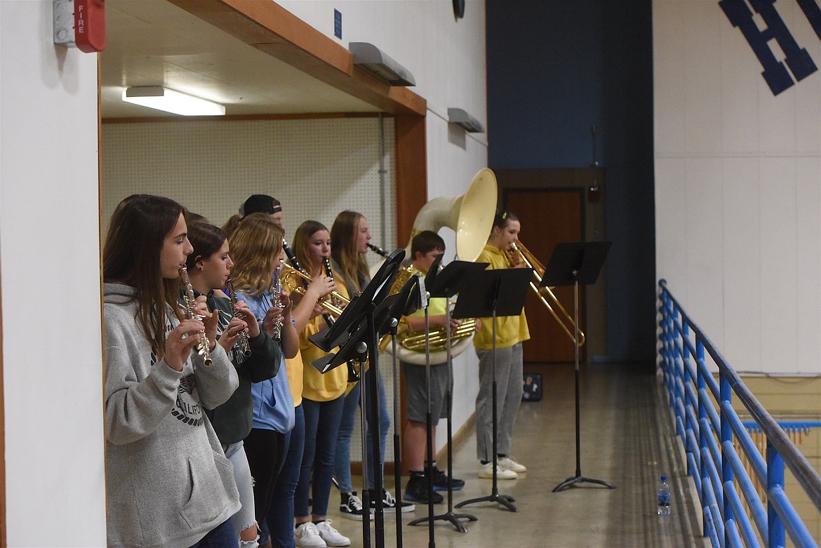 Members of the Libby High School band perform the national anthem at Thursday's volleyball match against Whitefish. (Scott Shindledecker/The Western News)