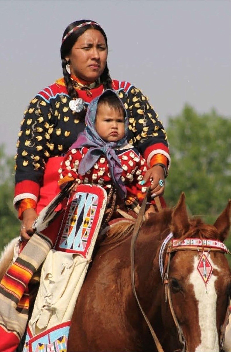 Hydee Wilson and her daughter, Charlie Kindness Wilson, in Crow dress.