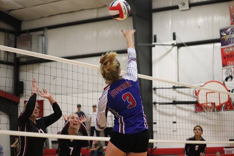 Superior senior Payton Milender goes high to spike a shot versus Seeley this past Saturday in Seeley. (Photo by Kami Milender)