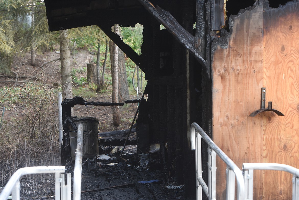 A structure fire at the Evergreen Mobile Home Park just west of Libby caused severe damage to a residence Monday afternoon. (Scott Shindledecker/The Western News)