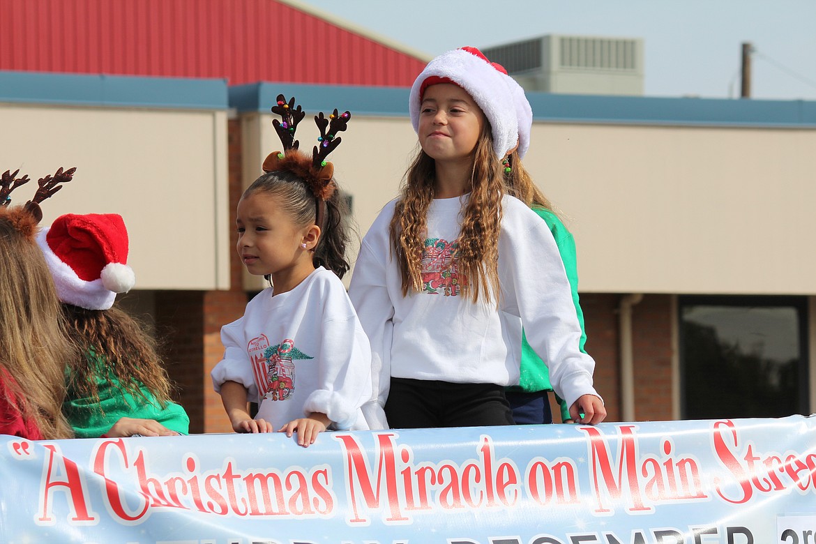 Othello Fair parade participants donned Santa hats and reindeer antlers Saturday to promote the Othello Christmas parade.