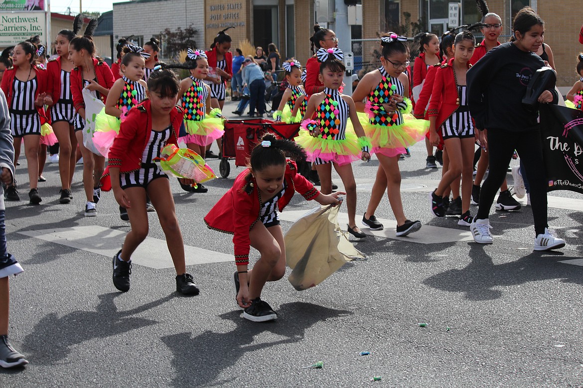 There was so much candy thrown out during the Othello Fair parade that there was candy for the girls from the dance school walking the parade route.