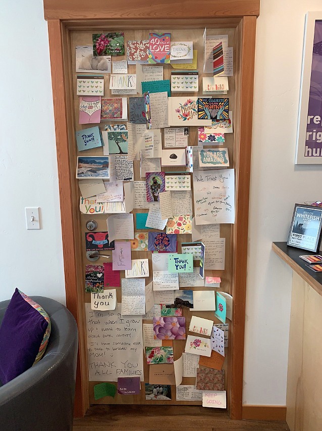 A collage of thank-you cards decorates the waiting room of All Families Healthcare. (Mara Silvers/MTFP)