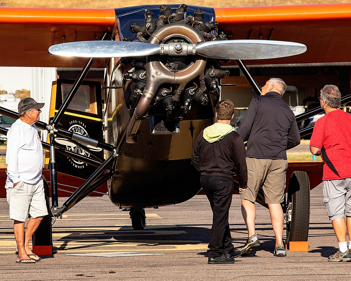 Visitors check out a vintage airliner during Saturday’s Experimental Aircraft Association’s local Chapter 1122 sponsored fly-in a pancake breakfast. (Rob Zolman/Lake County Leader)