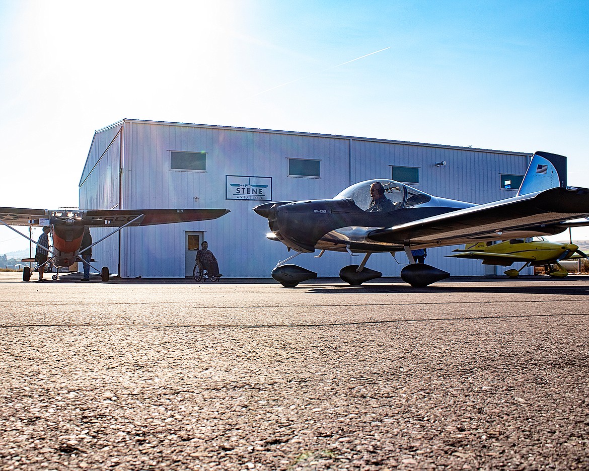 A pilot makes his way out to the runway during Saturday’s Experimental Aircraft Association’s local Chapter 1122 sponsored fly-in a pancake breakfast. (Rob Zolman/Lake County Leader)