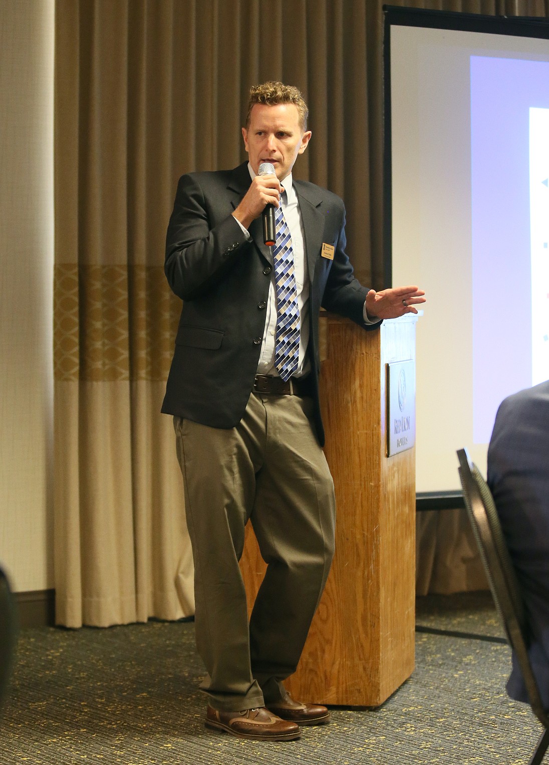 University of Idaho Coeur d'Alene's new CEO Andrew Fields speaks to attendees at the Post Falls Chamber's Connect4Lunch event Tuesday in Post Falls.