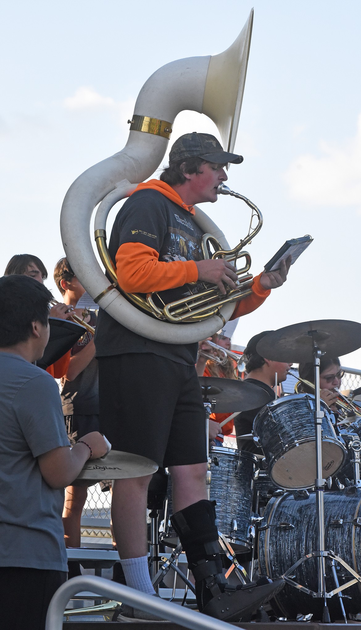Lineman Hayden Hakes demonstrates another talent as he plays tuba in the band. He was unable to play football on this evening while stuck in a walking cast.