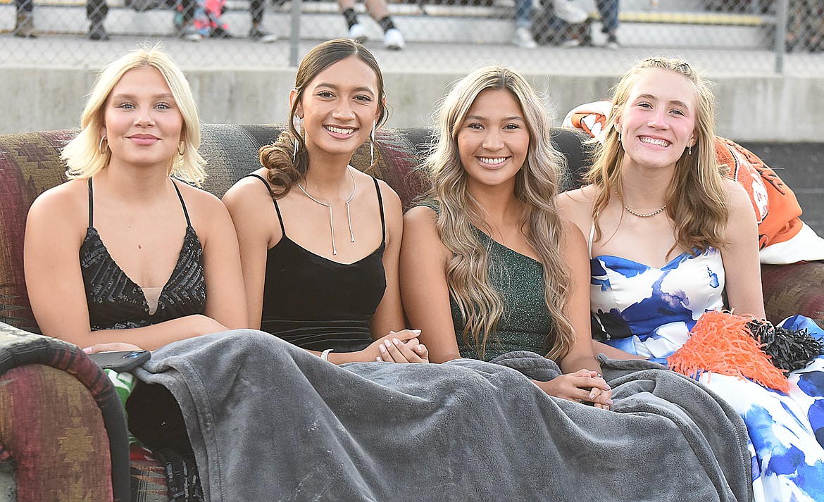 Homecoming princesses Sierra Cote, Alyssa Pretty On Top, Leina Ulutoa and Jase Frost, watch the Ronan High School homecoming game prior to the crowning of the king and queen. (Marla Hall/Lake County Leader)