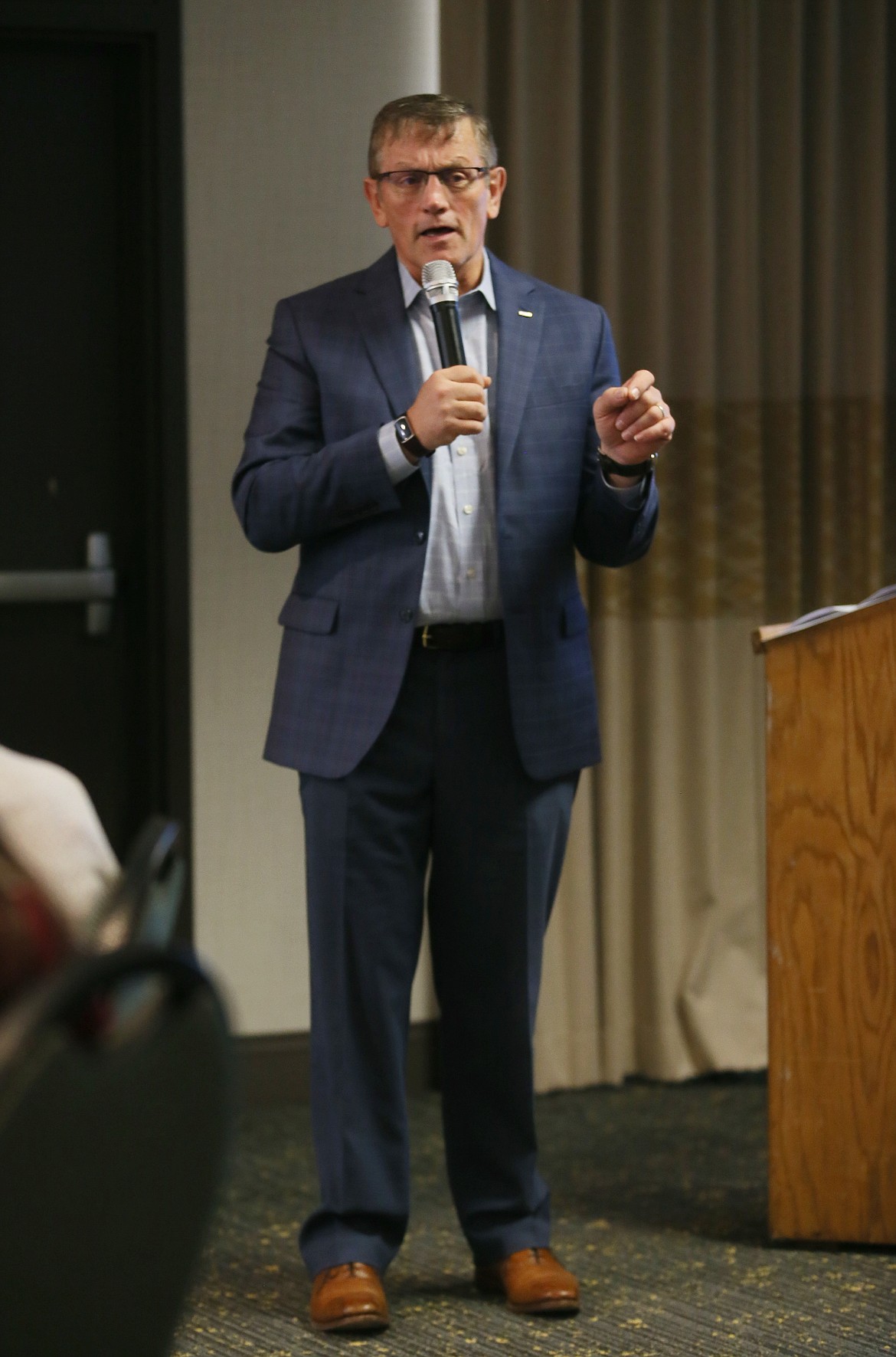 North Idaho College President Nick Swayne answers a question Tuesday during the Post Falls Chamber of Commerce's Connect4Lunch event.