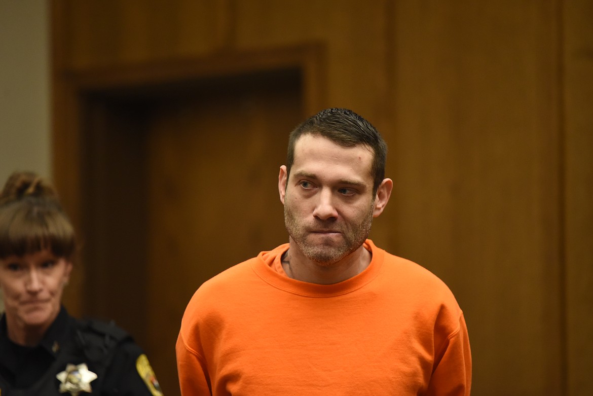 Robert Eugene McCarty departs the courtroom in Flathead County District Court after pleading guilty to felony criminal endangerment and misdemeanor assault with bodily fluid on Sept. 20, 2022. (Derrick Perkins/Daily Inter Lake)