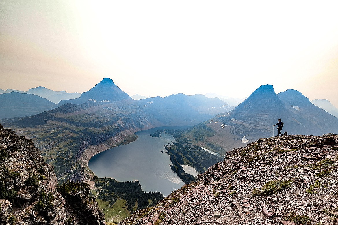 JP Edge photo
A hiker stands above Hidden Lake on the climbers trail to Mount Clements in Glacier National Park as haze from wildfires hangs over Glacier National Park recently.