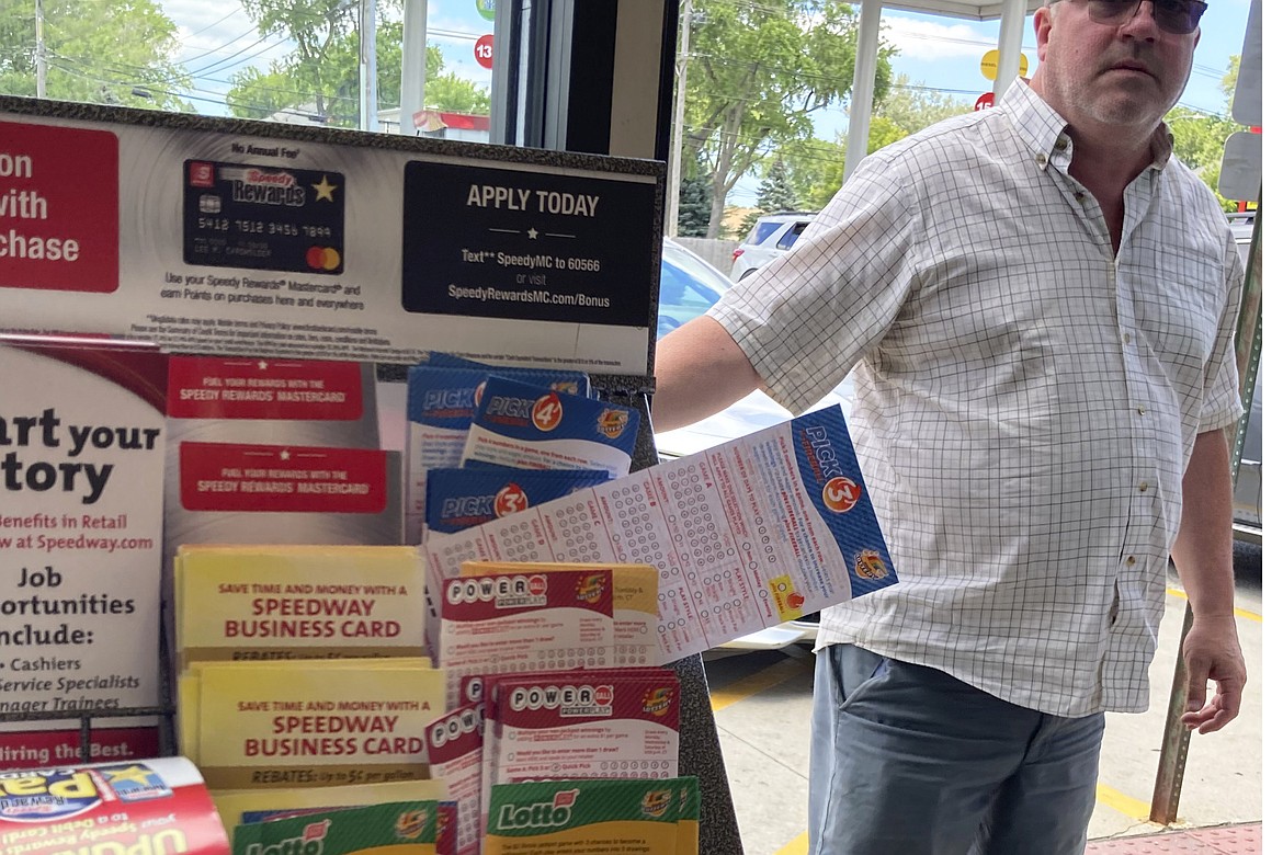 A customer walks in to the Speedway gas station in Des Plaines, Ill., where the winning Mega Millions lottery ticket was sold, Saturday, July 30, 2022. Two people who wish to remain anonymous have claimed a $1.337 billion Mega Millions jackpot after a single ticket to the late July drawing was sold in the Chicago suburb, lottery officials said Wednesday, Sept. 21.(AP Photo/Nam Y. Huh)