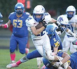 Wildcats thump Loggers on the road