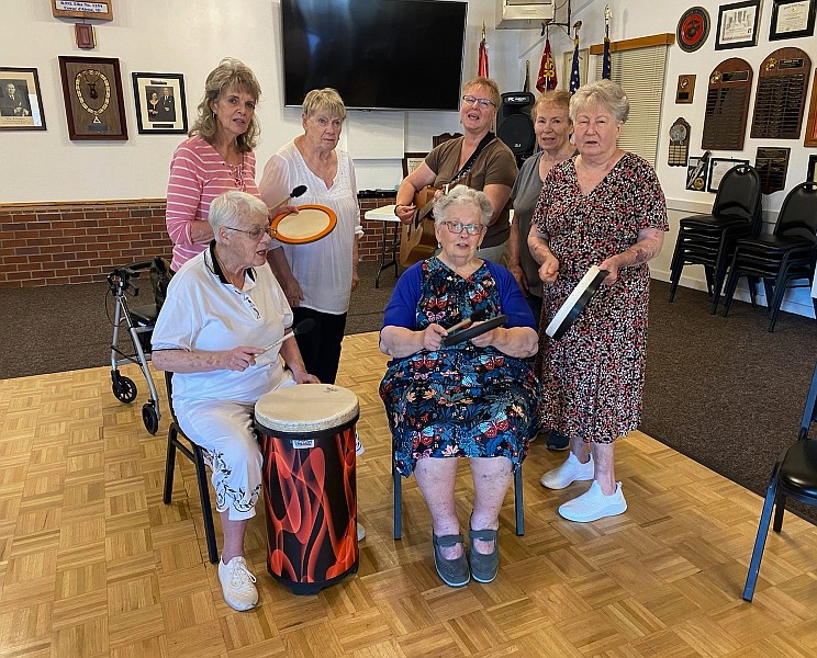 Music therapist Carla Carnegie, rear center, with guitar, will be one of the presenters during the Coeur d'Alene Parkinson's Support Group Keep on Moving health and wellness fair Oct. 6.