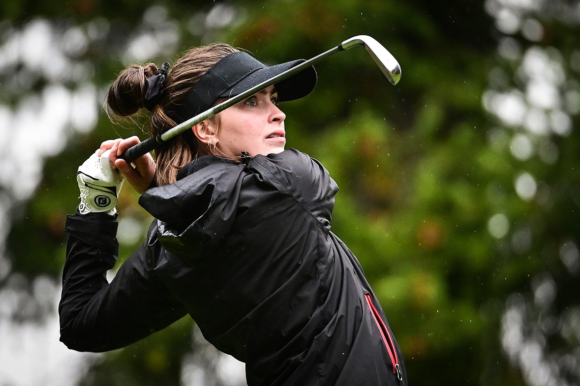 Missoula Hellgate's Anna Stensrud watches her shot off the fourth tee during Western AA Divisionals at Buffalo Hill Golf Club on Thursday, Sept. 22. (Casey Kreider/Daily Inter Lake)