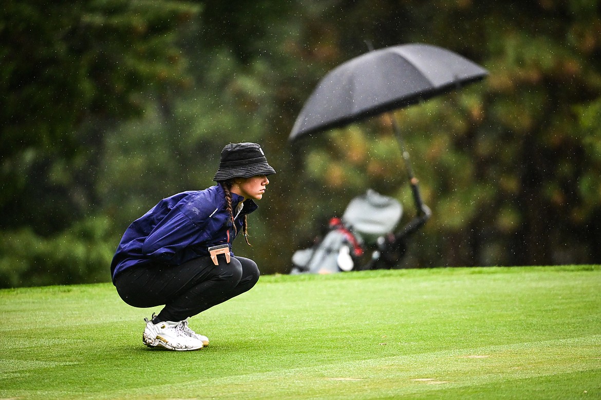 Glacier's Chloe Tanner lines up a putt on the third green during Western AA Divisionals at Buffalo Hill Golf Club on Thursday, Sept. 22. (Casey Kreider/Daily Inter Lake)