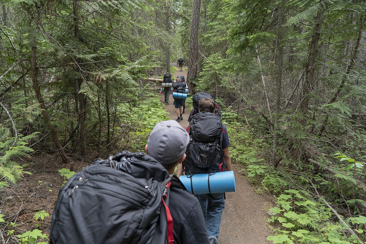 Teens at Turning Winds backpack across Vinyl Lake Trail, in Yaak, Montana. The residential treatment center, celebrating 20 years, spreads across 150 acres in the state’s northern woodlands. (Courtesy photo)