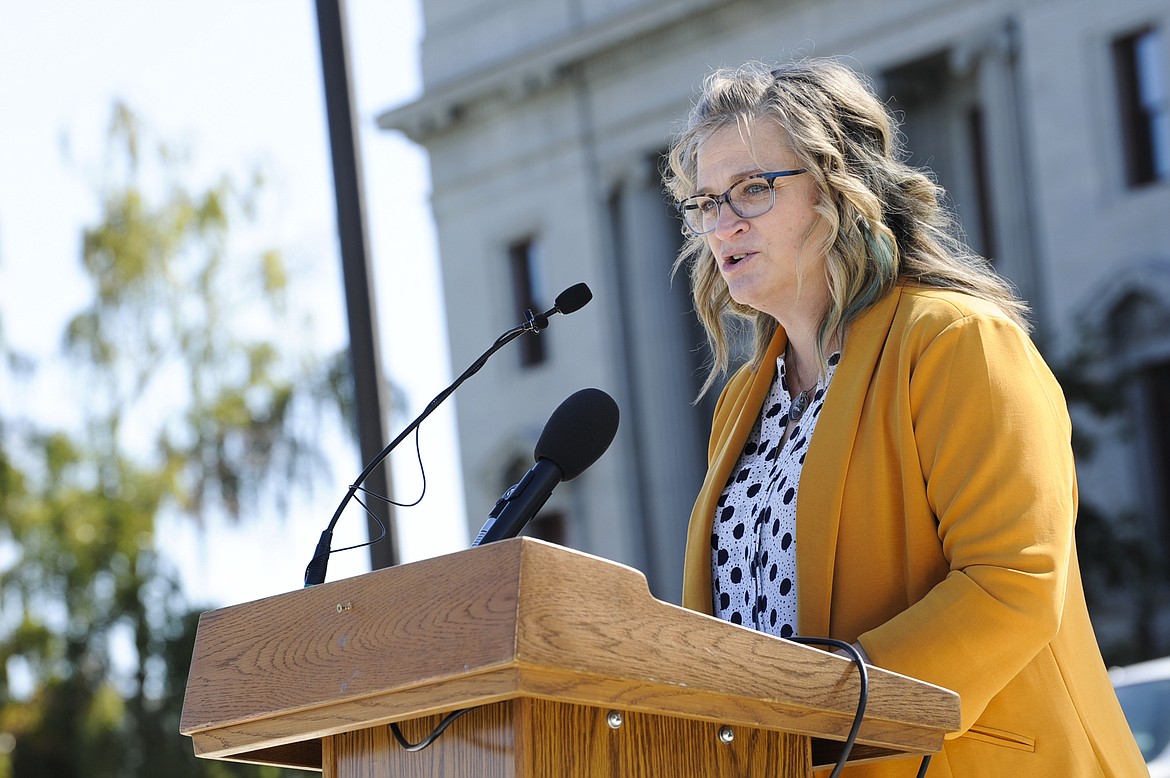 Jenna Bann, a mother from Missoula, Mont., speaks during a rally at the Montana Capitol in Helena, Mont., Wednesday, Sept. 21, 2022. Banna spoke in opposition to a proposed referendum that requires that all infants born alive, including during an attempted abortion, be provided with medical care and treatment. She spoke about her daughter, who was born without a properly developed brain, and said the referendum requiring treatment could have robbed her and her husband with the brief time they got to spend with their daughter before she died. (Thom Bridge/Independent Record via AP)