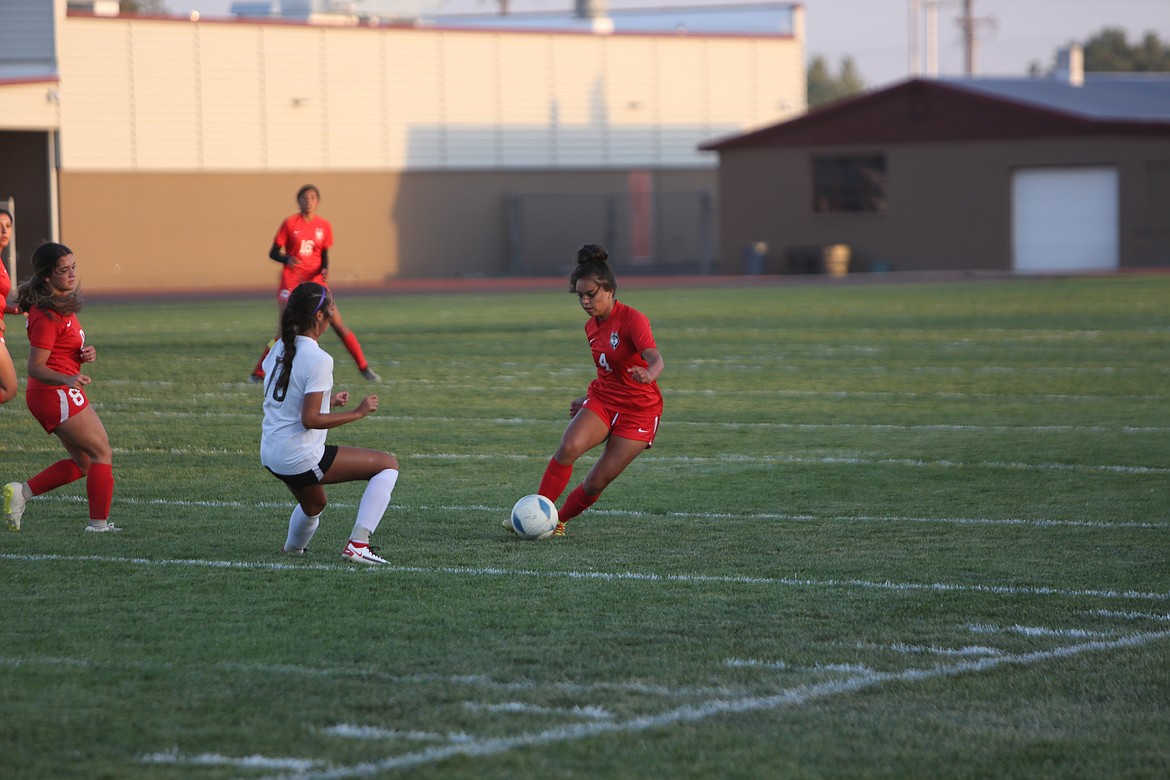 Sophomore midfielder Grace Rocha shakes an East Valley defender during Othello’s 4-0 loss to East Valley on Sept. 22, 2022.