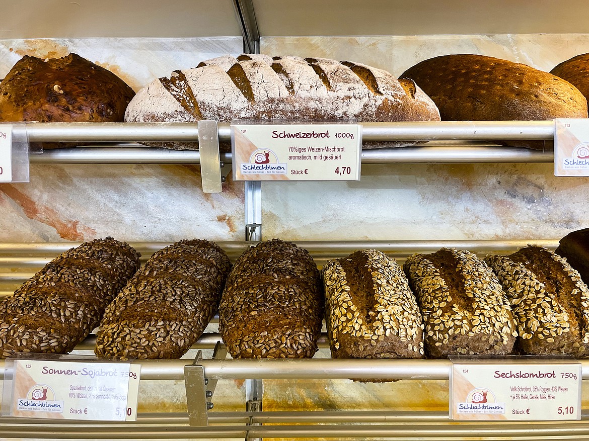 Bread is displayed for sale at the family bakery of Engelbert Schlechtrimen in Cologne, Germany, Wednesday, Sept. 21, 2022. For 90 years, the family of Engelbert Schlechtrimen has been baking wheat rolls, rye bread, apple, cheese and chocolate cakes in Cologne, but next month they'll turn off the ovens for good because they can no longer afford the rising energy prices resulting from Russia's war in Ukraine. (AP Photo/Daniel Niemann)