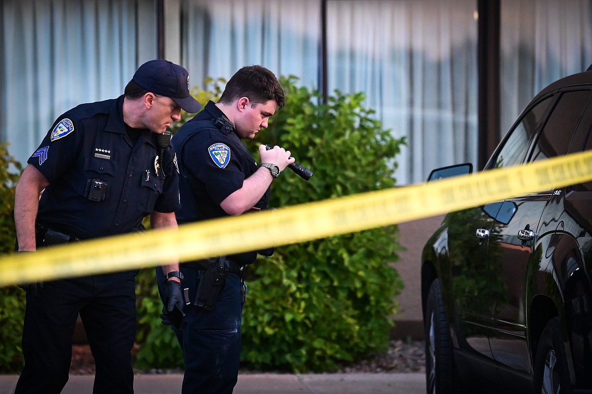 Kalispell police investigate at the scene of a shooting incident in a parking lot outside the Kalispell Center Mall on Saturday, Sept. 24. (Casey Kreider/Daily Inter Lake)