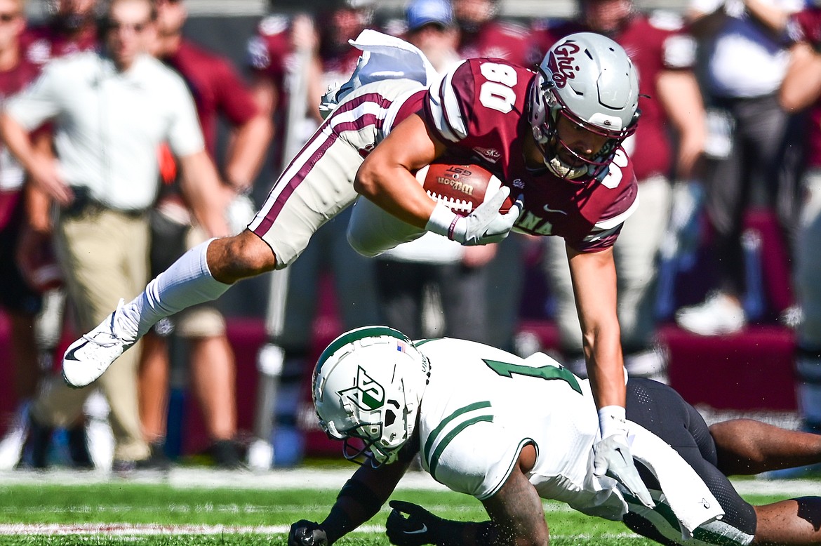 Montana wide receiver Mitch Roberts (80) is tackled after a reception in the first quarter against Portland State at Washington-Grizzly Stadium on Saturday, Sept. 24. (Casey Kreider/Daily Inter Lake)