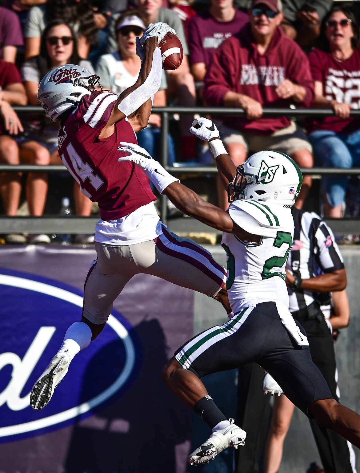 Montana wide receiver Aaron Fontes (14) holds on to a touchdown reception in the fourth quarter against Portland State at Washington-Grizzly Stadium on Saturday, Sept. 24. (Casey Kreider/Daily Inter Lake)