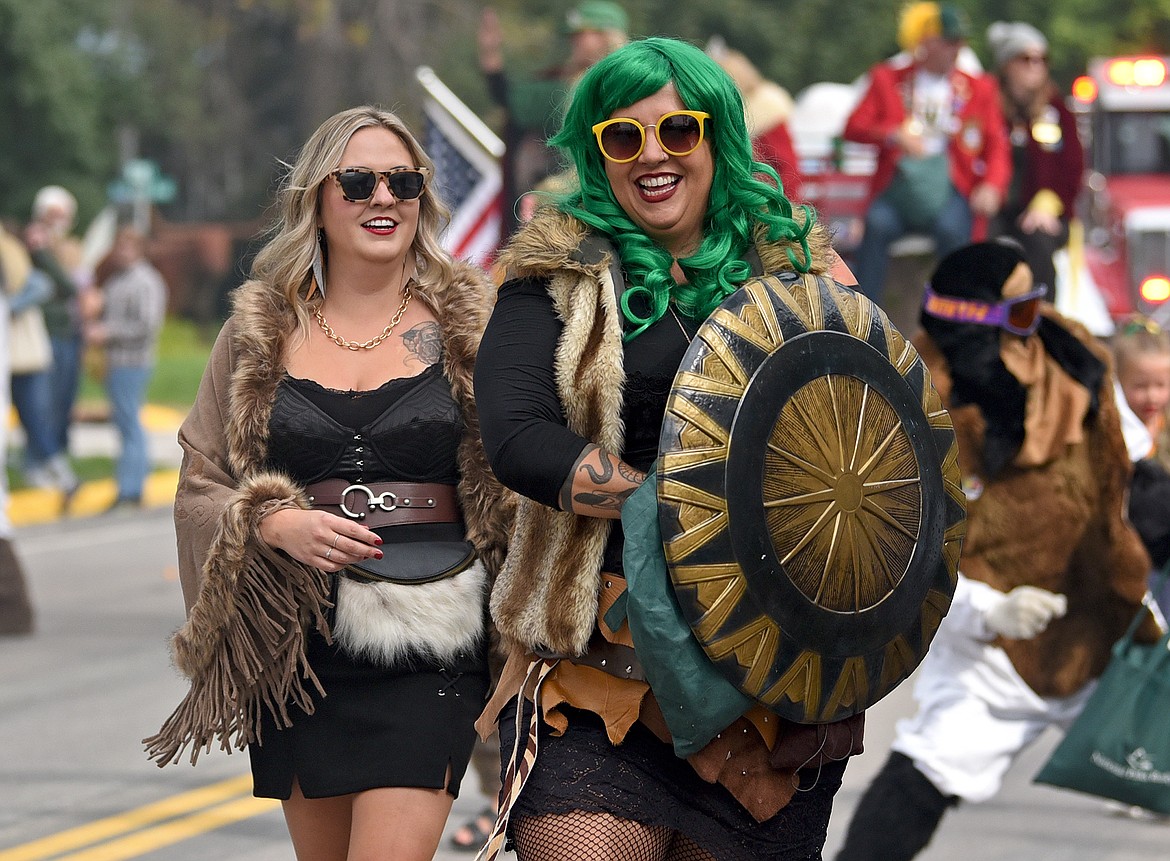 Whitefish Winter Carnival characters stroll down Second Street in the 2022 Whitefish Homecoming Parade. (Whitney England/Whitefish Pilot)