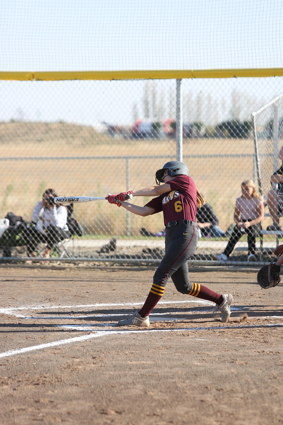 Moses Lake freshman Ava Swett swings at a pitch during the Maverick’s 10-0 win over Hermiston last Tuesday.