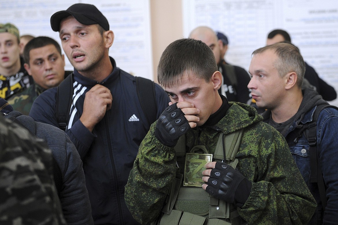 Russian recruits gather inside a military recruitment center of Bataysk, Rostov-on-Don region, south of Russia, Monday, Sept. 26, 2022. Russian President Vladimir Putin last Wednesday ordered a partial mobilisation of reservists to beef up his forces in Ukraine. (AP Photo, File)