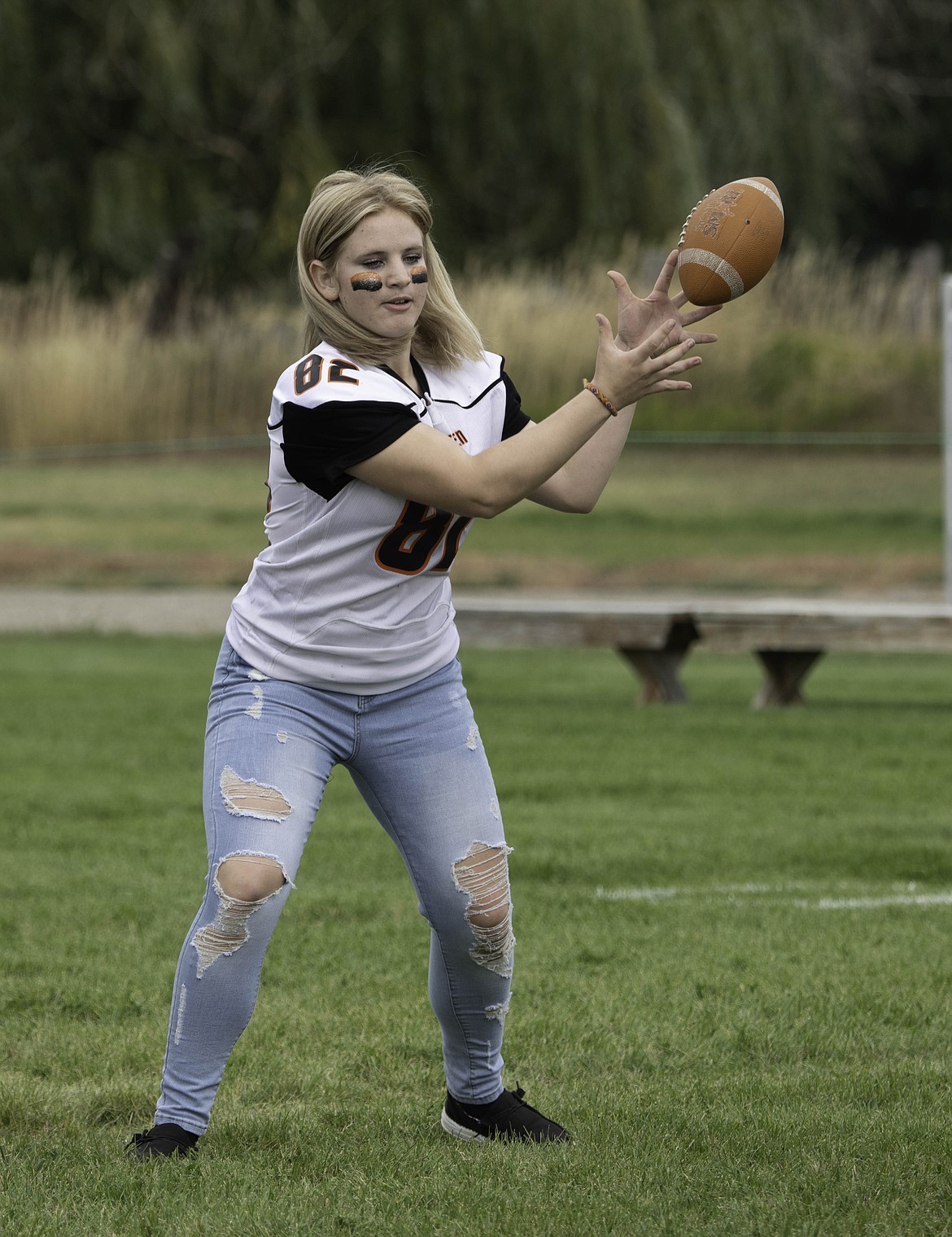 Maddy Blood as quarterback in the powder puff game. (Tracy Scott/Valley Press)