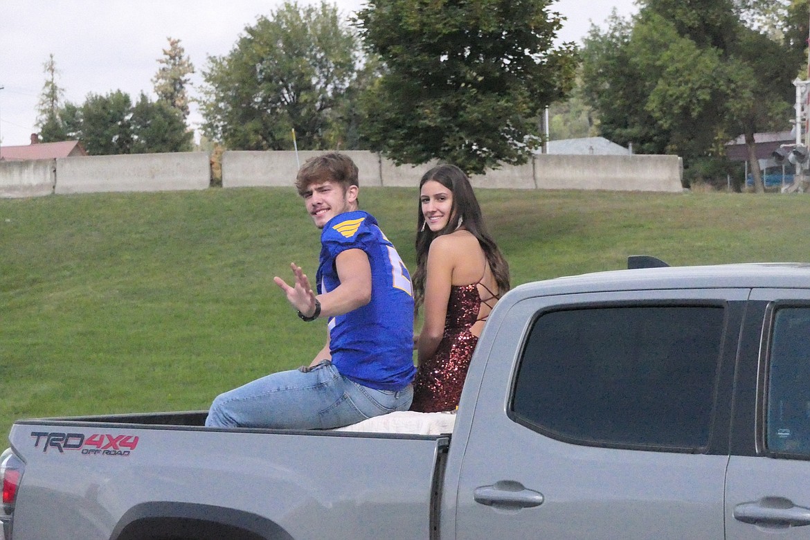 Homecoming court members Breck Ferris and Avery Burgess ride in style during the annual homecoming parade through downtown Thompson Falls on Saturday. (Chuck Bandel/VP-MI)