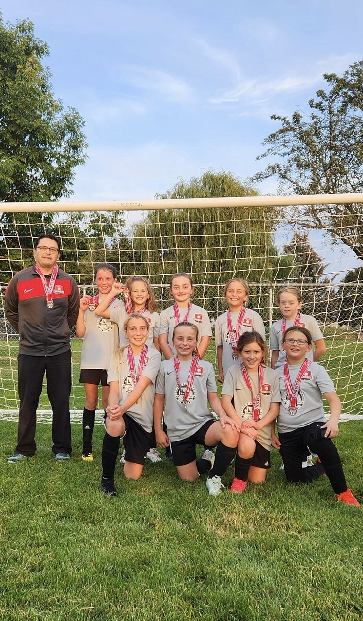Courtesy photo
The Thorns North FC 2013 girls soccer team took second place in the U10 girls Gold Division at the recent Pend Oreille Cup in Sandpoint. The Thorns went 3-1 in the tournament, losing to the Sandpoint Strikers 4-3 in the championship. In the front row from left are Kyal Carlson, Nora Schock, Emma Storlie and Felicity Miller; and back row from left, coach Tomas Barrera, Kinsey Kiefer, Presley Hart, Peyton Cantrell, Nora Snyder and Isla King.