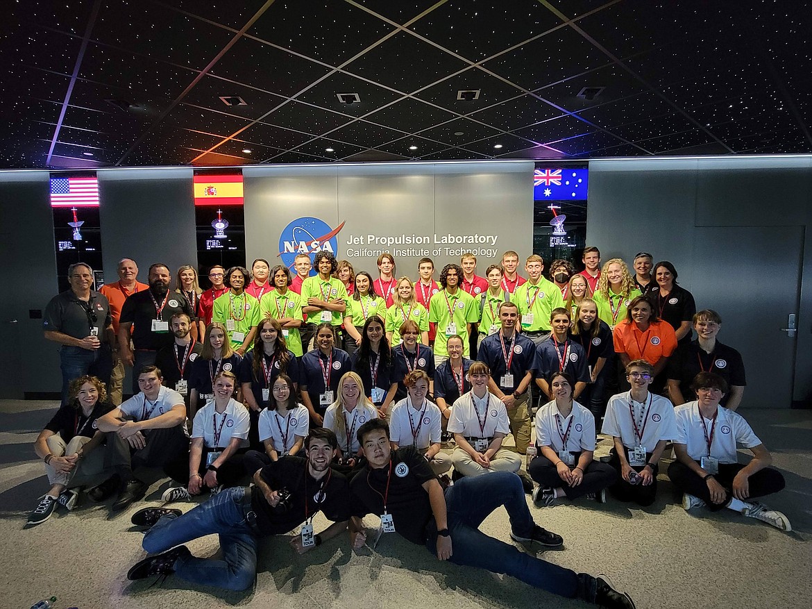 Idaho Science and Aerospace students pose for a group photo in their team colors. Myers pictured middle of third row with her team.