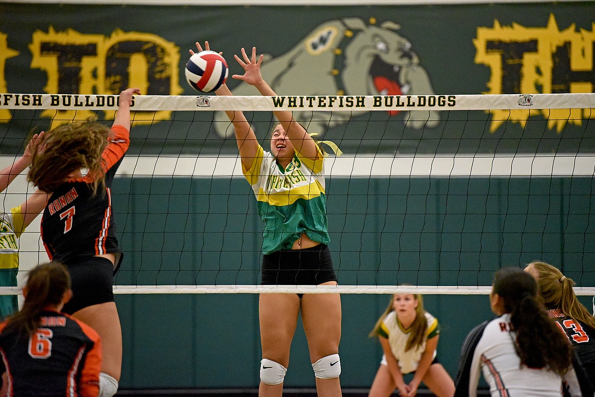 Whitefish's Isabella Hartwig gets a block in a game against Ronan on Tuesday, Sept. 20. (Whitney England/Whitefish Pilot)