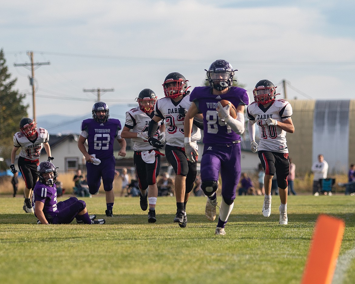 Charlo Viking Keaton Piedalue scampers down the sideline for a touchdown. (Rob Zolman/Lake County Leader)