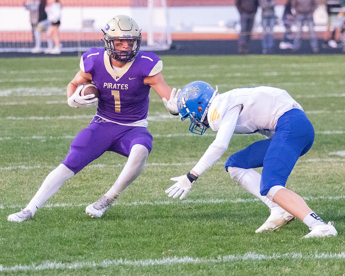 Polson Pirate Owen McElwee makes a catch and looks for extra yards. (Rob Zolman/Lake County Leader)