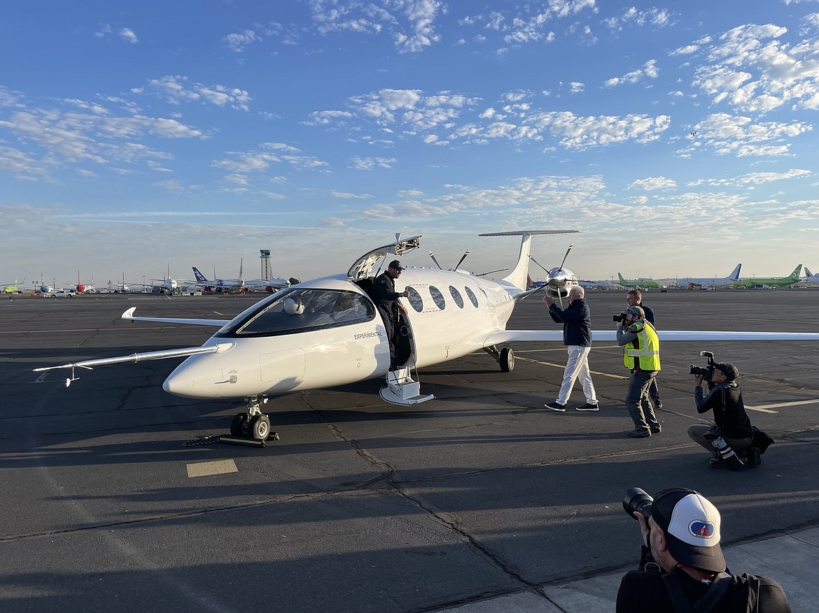 Eviation test pilot Steven Crane gives a thumbs up as he exits the company’s battery-powered Alice airplane, which flew for the first time Tuesday morning at the Grant County International Airport. The company is working with AeroTEC in Moses Lake to get the aircraft certified for commercial sale.