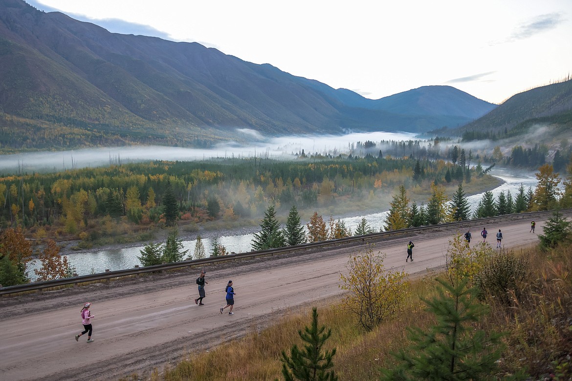 Competitors in the Cedar Creek Marathon along the North Fork Road on Sept. 24. (JP Edge photo)