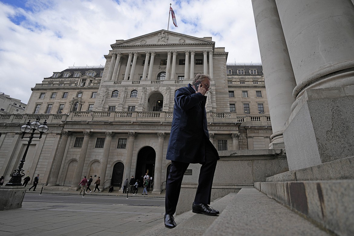 A man walks up the stairs in front of the Bank of England in London, Wednesday, Sept. 28, 2022. The Bank of England has launched a temporary bond-buying programme as it takes emergency action to prevent "material risk" to UK financial stability. (AP Photo/Frank Augstein)