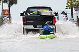 Ian swamps southwest Florida, trapping people in homes