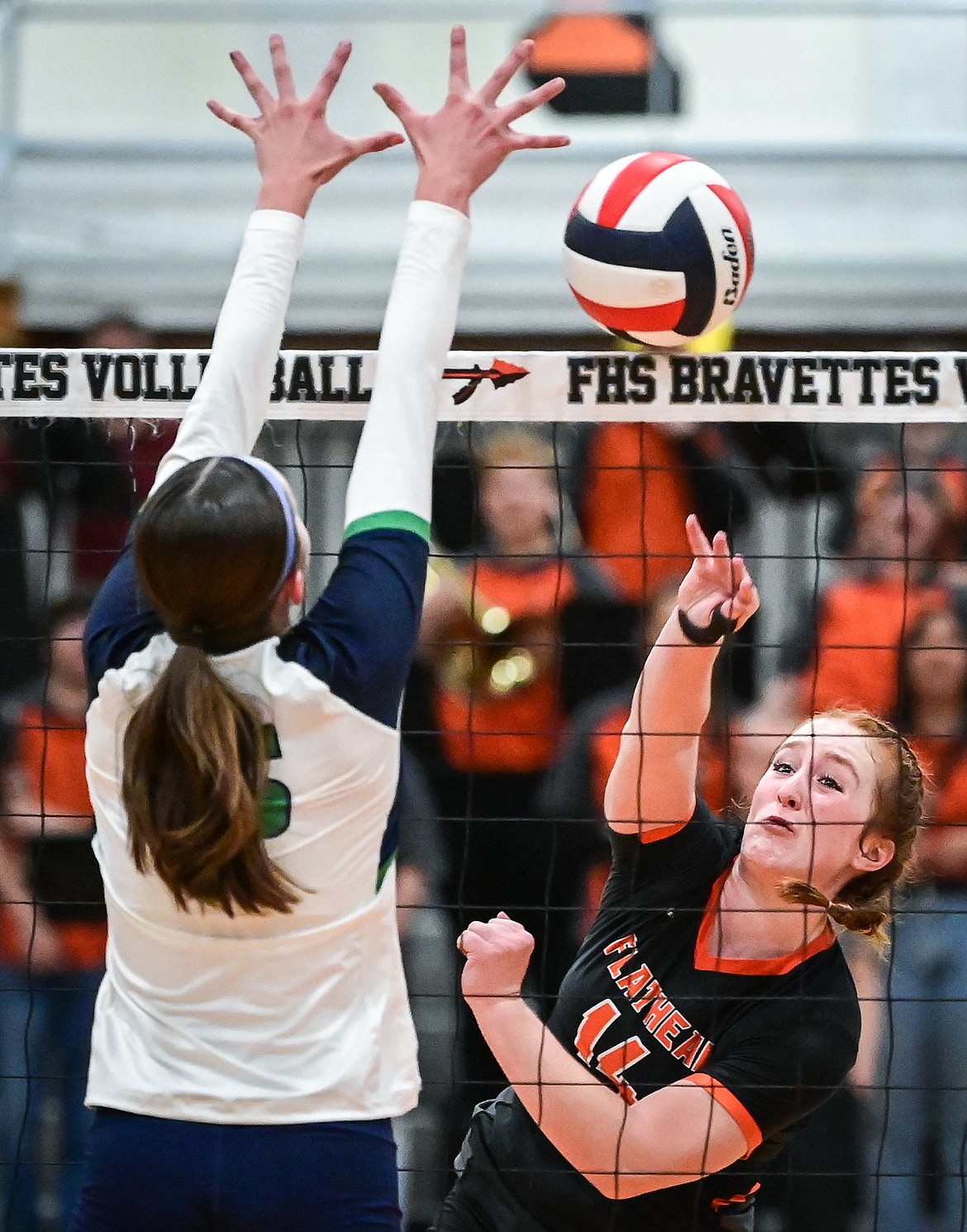 Flathead's Libby Peltz (14) goes up for a kill against Glacier during crosstown volleyball at Flathead High School on Thursday, Sept. 29. (Casey Kreider/Daily Inter Lake)
