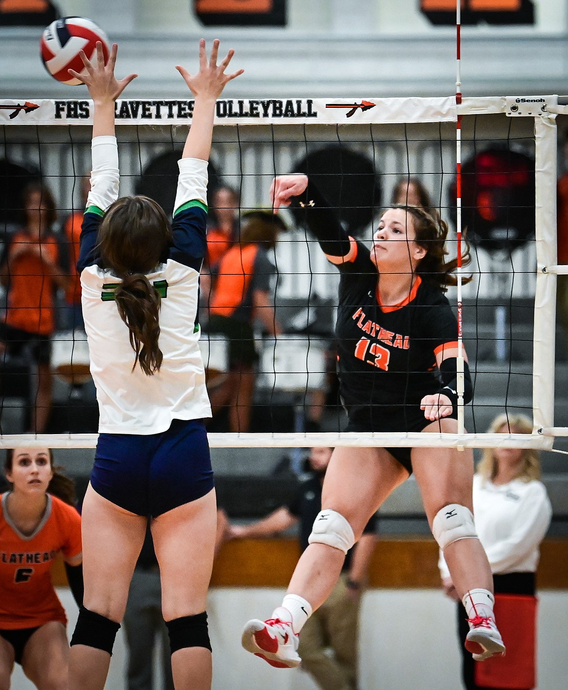 Flathead's Olive Lyngholm (13) goes up for a kill against Glacier during crosstown volleyball at Flathead High School on Thursday, Sept. 29. (Casey Kreider/Daily Inter Lake)