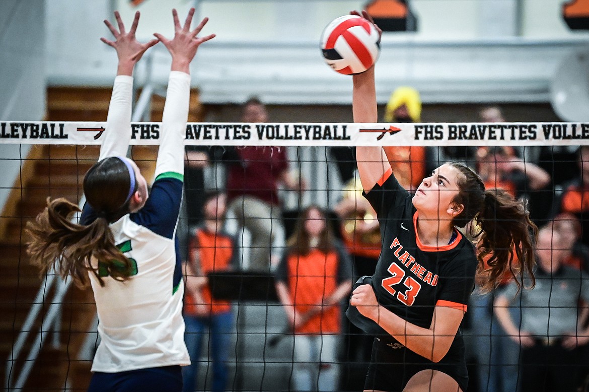 Flathead's Sienna Sterck (23) goes up for a kill against Glacier during crosstown volleyball at Flathead High School on Thursday, Sept. 29. (Casey Kreider/Daily Inter Lake)